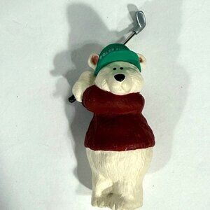 Bear playing golf Christmas ornament.